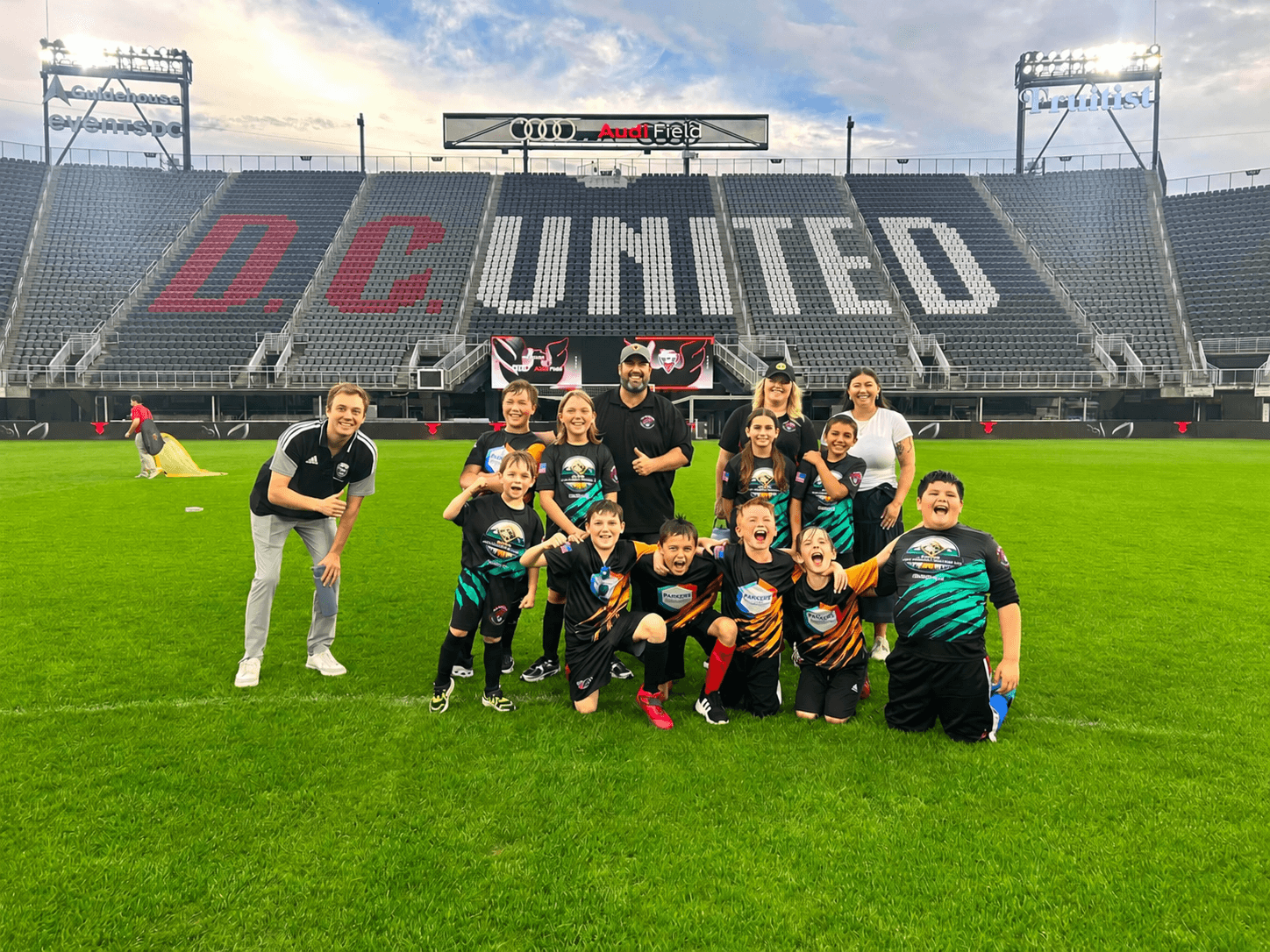 Raptors players together at Audi Field.