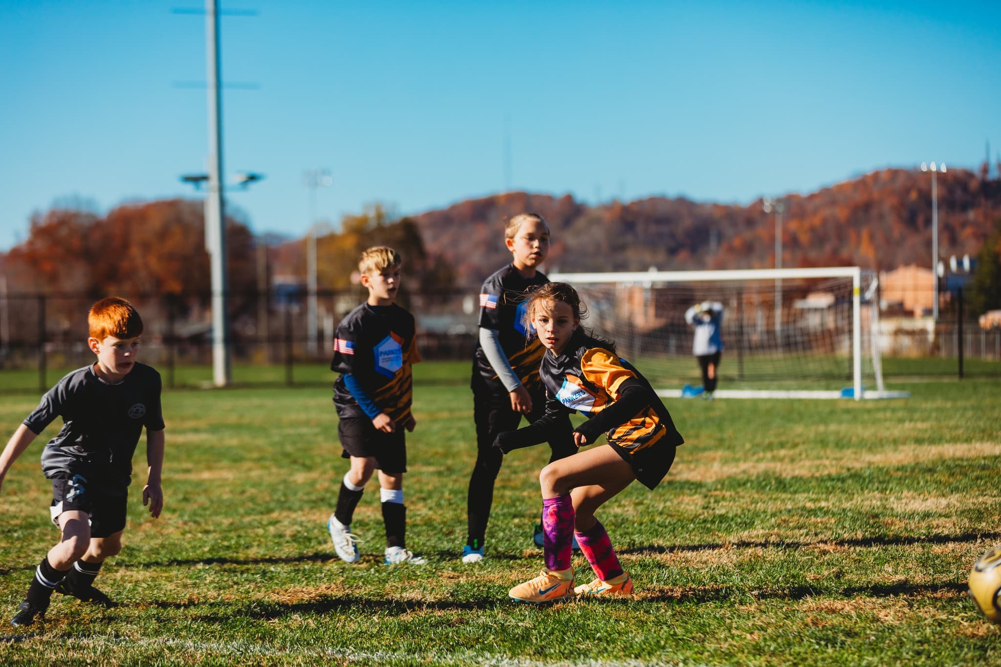 Travel soccer players during a match.
