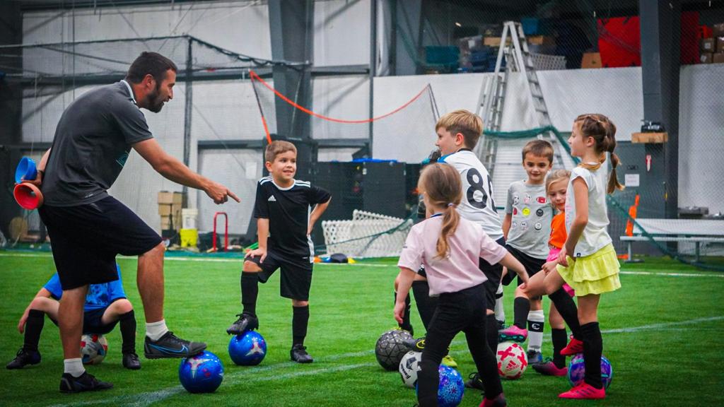 Young kids at soccer training